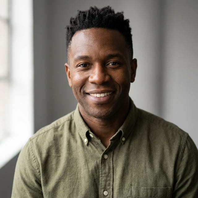 Studio headshot of Dev Okafor, SEO Practitioner (illustrative, AI-generated)